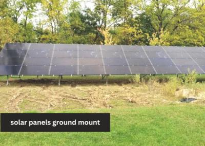 A field with some trees and a solar panel