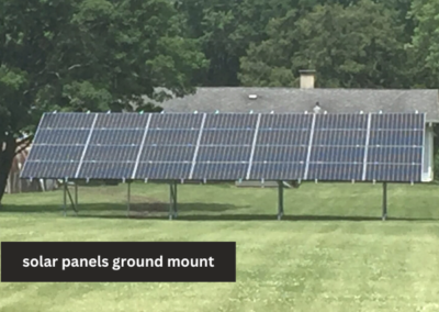 A solar panel ground mount in the middle of a field.