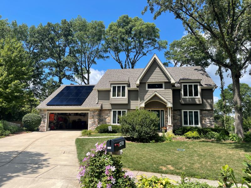 solar panels on home's garage after new roof installation
